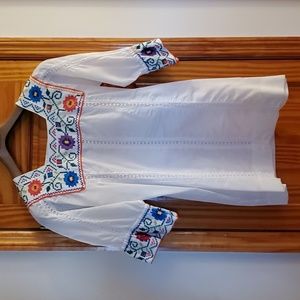 Handmade South American inspired white dress with colorful cross-stitch details
